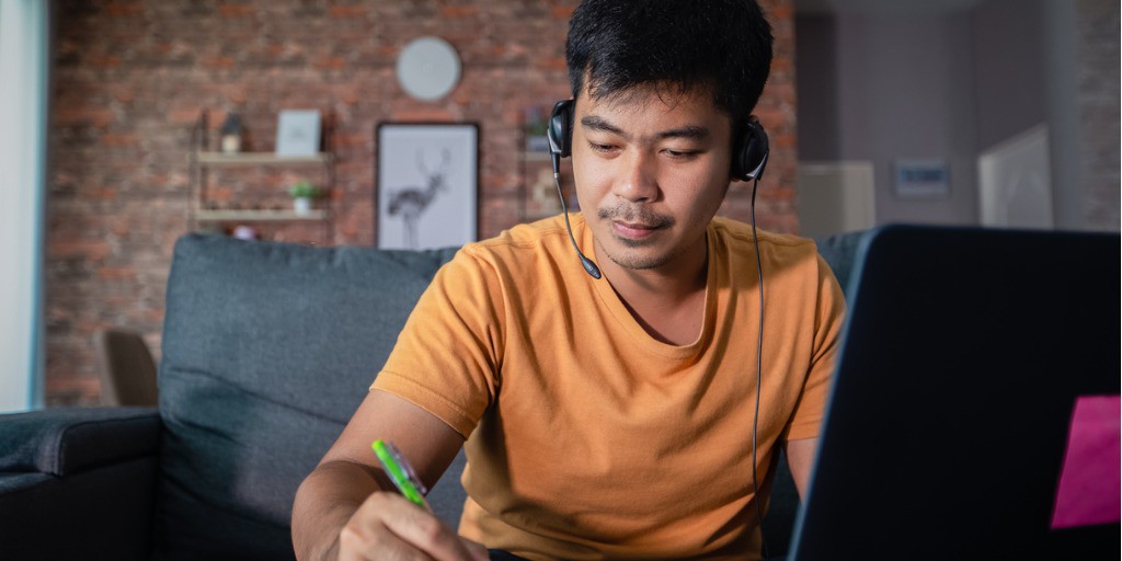 asian-businessmen-is-using-notebook-computers-and-wear-headphones-for-picture-id1225824915 Employee learning from home
