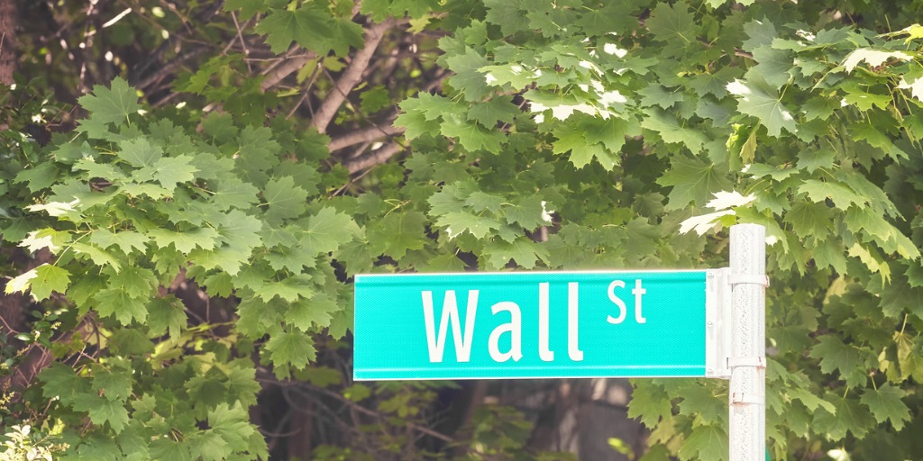 wall-street-road-sign-with-blurred-green-trees-in-background-focus-picture-id1313256989 The US are playing catchup to the UK when it comes to sustainable finance regulation