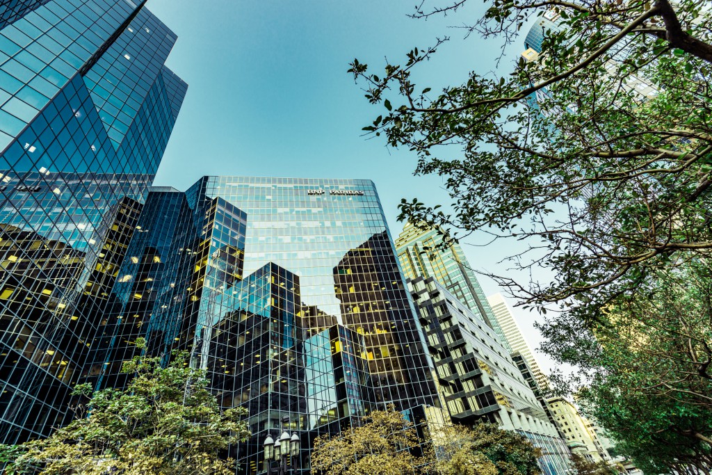 Office buildings among green trees