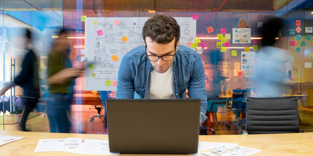 man-working-at-a-creative-office-using-his-computer-and-people-moving-picture-id1332176260 Simply put, problem solving is a mental activity which entails the discovery, analysis, and resolving of problems.