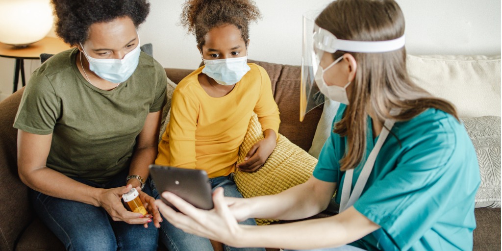 female-doctor-and-home-care-for-a-sick-girl-at-home-picture-id1298691756