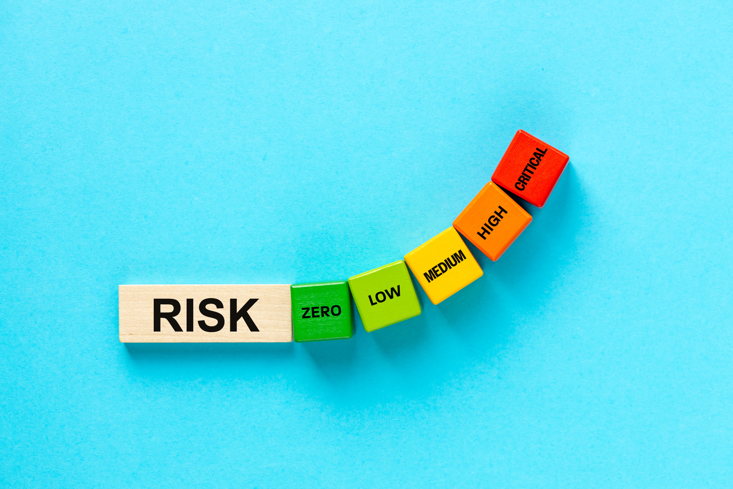 Growing risk from zero to critical level. Scale going up. Business and financial concept. Close up. Beautiful blue background